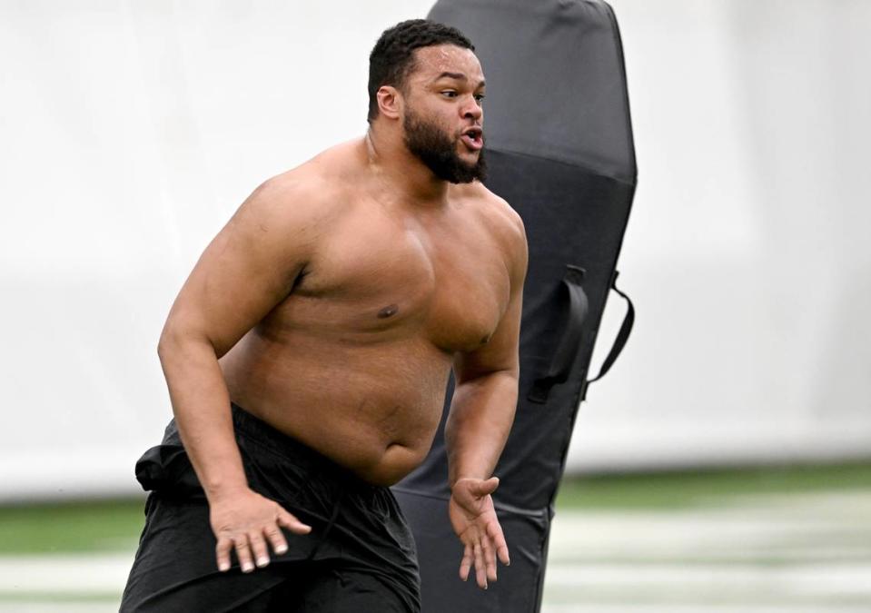 Defensive tackle PJ Mustipher runs position drills during Penn State football’s Pro Day on Friday, March 24, 2023.