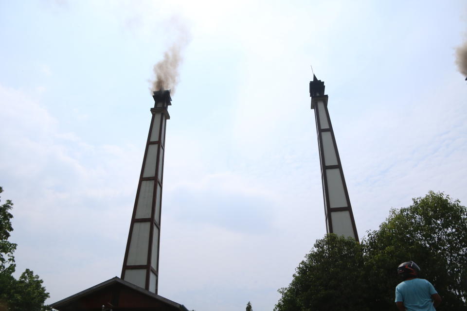 In this April 1, 2021 photo provided by Dawei Watch news outlet, smoke rises from the chimney of a crematorium where 17-year old Kyaw Min Latt's body was incinerated in Dawei, Myanmar. His March 27, 2021 shooting by a soldier was captured on CCTV cameras and shared through social media. (Dawei Watch via AP)