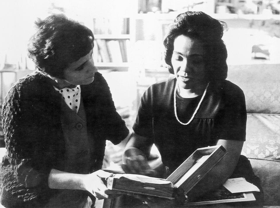 FILE - In this 1968 file photo, Coretta Scott King and Associated Press reporter Kathryn Johnson, left, review plans for The King Center during a meeting on the campus of Atlanta University in Atlanta. Johnson, a trailblazing reporter for The Associated Press, died Wednesday, Oct. 23, 2019, at the age of 93, in Atlanta. Her intrepid coverage of the civil rights movement and other major stories led to a string of legendary scoops. Johnson was the only journalist allowed inside Martin Luther King Jr.'s home the day he was assassinated. (AP Photo, File)