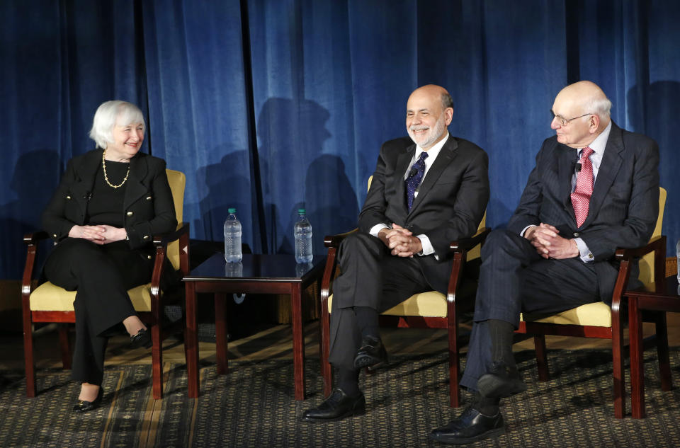 FILE - In this April 7, 2016, file photo from left, Federal Reserve chair Janet Yellen, and former Federal Reserve chairs Ben Bernanke, Paul Volcker appear together for the first time in New York. (AP Photo/Kathy Willens, Pool, File)