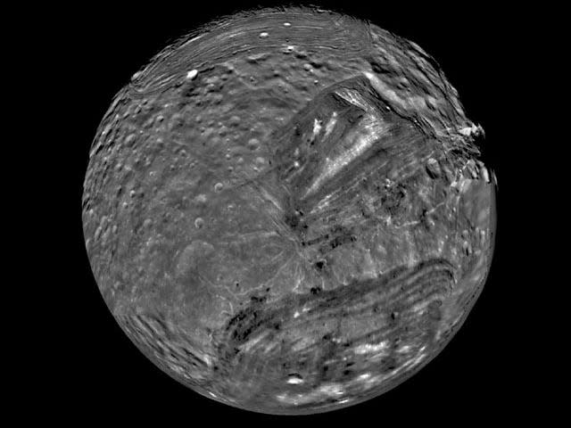 Miranda, Uranus's moon, seen by Voyager.