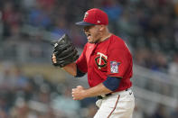 Minnesota Twins relief pitcher Caleb Thielbar celebrates after the top of the sixth inning against the Kansas City Royals in a baseball game Monday, Aug. 15, 2022, in Minneapolis. (AP Photo/Abbie Parr)