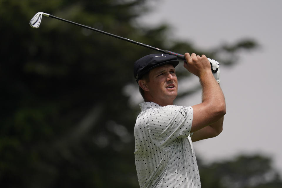 Bryson DeChambeau watches his tee shot on the third hole during the third round of the PGA Championship golf tournament at TPC Harding Park Saturday, Aug. 8, 2020, in San Francisco. (AP Photo/Jeff Chiu)