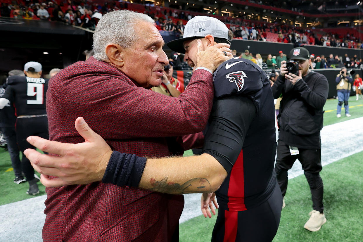 ATLANTA, GEORGIA - DECEMBER 24: Atlanta Falcons owner Arthur Blank celebrates with Taylor Heinicke #4 of the Atlanta Falcons after a win over the Indianapolis Colts at Mercedes-Benz Stadium on December 24, 2023 in Atlanta, Georgia. (Photo by Kevin C. Cox/Getty Images)