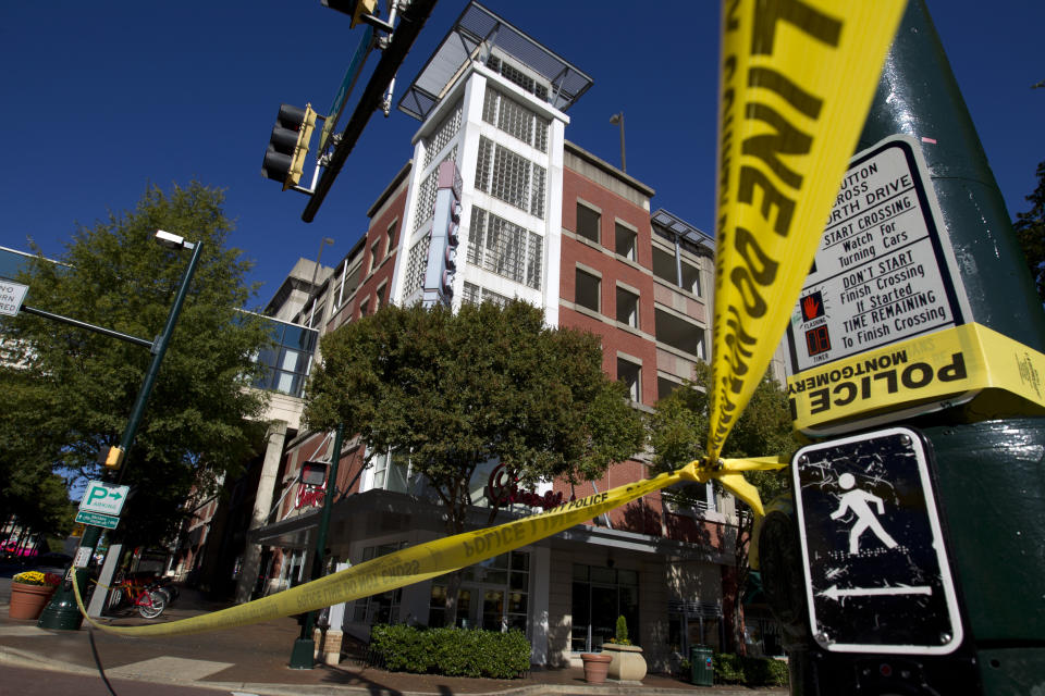 A parking garage is seen where a police officer was shot, in downtown Silver Spring, Md., Monday, Oct. 14, 2019. Police in Montgomery County, Maryland, said they were searching for at least one person after an officer was found shot in a parking garage in downtown Silver Spring on Monday. (AP Photo/Jose Luis Magana)