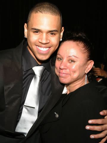 <p>Amy Tierney/WireImage</p> Chris Brown, with his mom Joyce Hawkins.