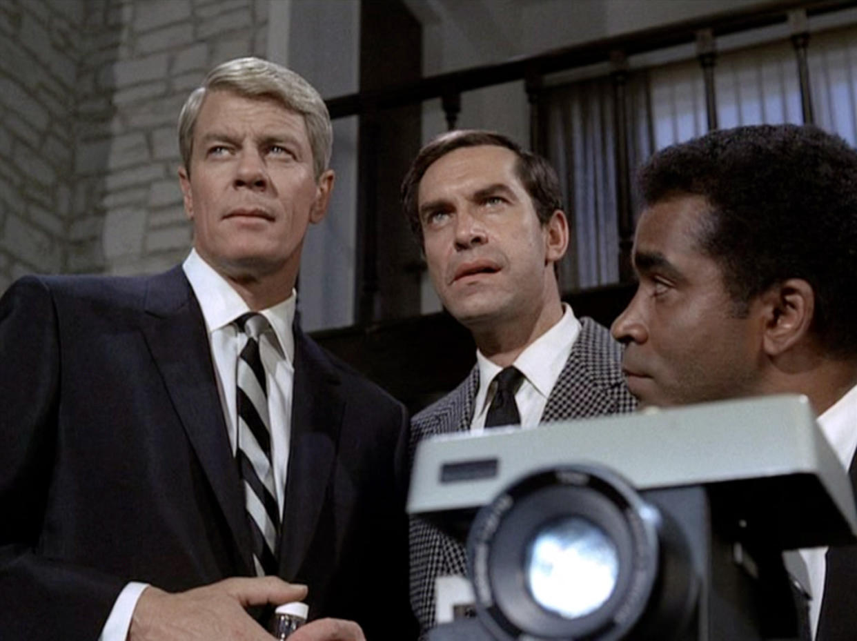 LOS ANGELES - FEBRUARY 23: Peter Graves as James Phelps, Martin Landau as Rollin Hand and Greg Morris as Barney Collier in the Mission Impossible episode, "Live Bait"  Original airdate, February 23, 1969.  Image is a frame grab.  (Photo by CBS via Getty Images) 