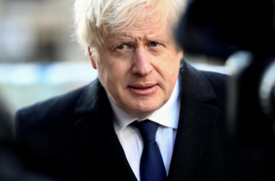 Prime Minister Boris Johnson attends the London Bridge crime scene in central London after a terrorist wearing a fake suicide vest who went on a knife rampage killing two people, was shot dead by police.