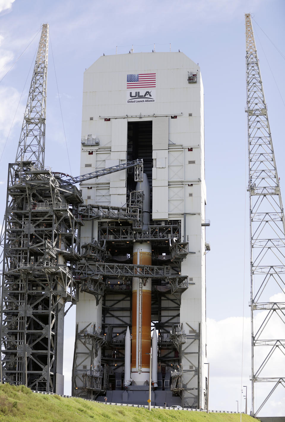 A United Launch Alliance Delta IV rocket stands ready with a payload of the second Global Positioning System III on space launch complex 37 at the Cape Canaveral Air Force Station, Wednesday, Aug. 21, 2019, in Cape Canaveral, Fla. The launch is scheduled for Thursday morning. (AP Photo/John Raoux)