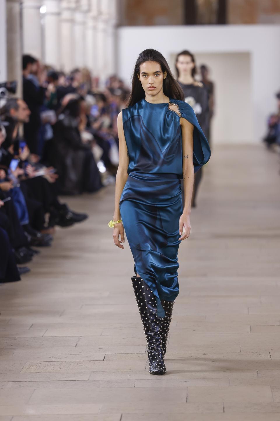 A model wears a creation as part of the Lanvin Fall/Winter 2023-2024 ready-to-wear collection presented Sunday, March 5, 2023 in Paris. (Vianney Le Caer/Invision/AP)