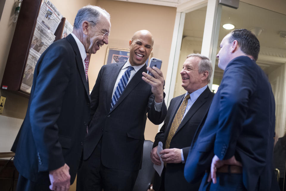 From left, Sens. Chuck Grassley, Cory Booker, Dick Durbin and Mike Lee after the passage of the First Step Act on Dec. 19. (Photo: Tom Williams/CQ Roll Call/Getty Images)