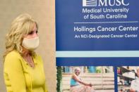 First Lady Jill Biden listens during a presentation on health disparities during a tour of the MUSC Hollings Cancer Center on Monday, Oct. 25, 2021, in Charleston, S.C. (AP Photo/Meg Kinnard)