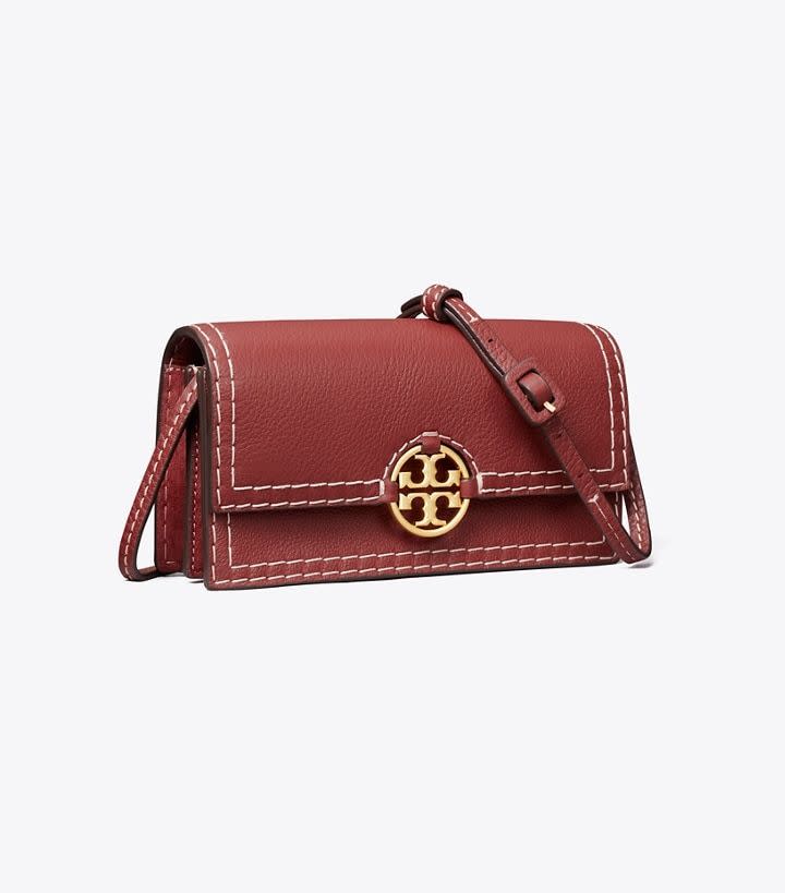 <p><a href="https://go.redirectingat.com?id=74968X1596630&url=https%3A%2F%2Fwww.toryburch.com%2Fen-us%2Fhandbags%2Fmini-bags%2Fmiller-heavy-stitch-wallet-crossbody%2F143184.html%3Fcolor%3D600&sref=https%3A%2F%2Fwww.townandcountrymag.com%2Fstyle%2Ffashion-trends%2Fg42998995%2Ftory-burch-sale%2F" rel="nofollow noopener" target="_blank" data-ylk="slk:Shop Now;elm:context_link;itc:0;sec:content-canvas" class="link ">Shop Now</a></p><p>Miller Heavy Stitch Crossbody</p><p>$259.00</p><p>toryburch.com</p><span class="copyright">Tory Burch</span>