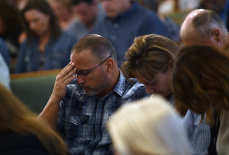 Worshippers attend a May 20, 2018, mass at Arcadia First Baptist Church in memory of the Santa Fe High School shooting victims in Texas