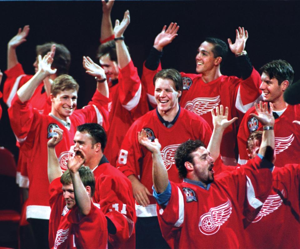 At the 1997 rally for season-ticket holders at Joe Louis Arena, the newly crowned Stanley Cup-champion Red Wings followed Kevin Hodson’s lead and raised the roof. Associate coach Dave Lewis said he did it all during the championship parade, fans followed suit, but “my arms are so sore now.”