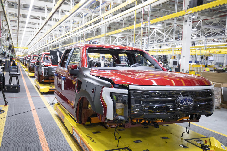 DEARBORN, MI - APRIL 26: Ford F-150 Lightning pickup trucks sit on the production line at the Ford Rouge Electric Vehicle Center on April 26, 2022 in Dearborn, Michigan. The F-150 Lightning is positioned to be the first full-size all-electric pickup truck to go on sale in the mainstream U.S. market. (Photo by Bill Pugliano/Getty Images)