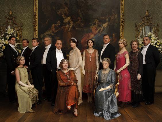 Michelle Dockery (centre) with the Downton Abbey cast (ITV)