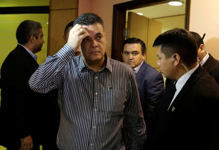 President of Paraguay's Congress Roberto Acevedo leaves his office in the Congress building in Asuncion, Paraguay March 31, 2017. REUTERS/Jorge Adorno