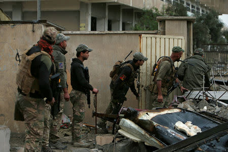 Members of Iraqi rapid response forces are pictured during clashes with Islamic State militants in Mosul, Iraq March 13, 2017. REUTERS/Azad Lashkari