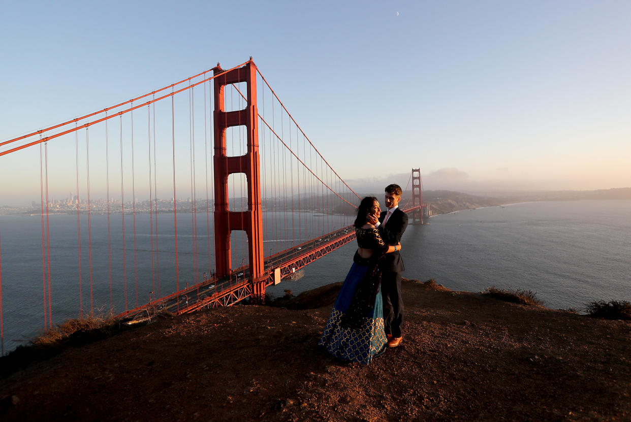 The sunset at an overlook beside the Golden Gate Bridge in San Francisco on Aug. 22, 2020.  / Credit: Luis Sinco / Los Angeles Times via Getty Images  