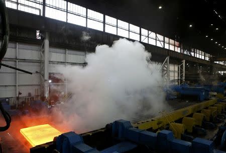 Steel is seen in the rolling mill following the recommissioning of the works by Liberty Steel Group at the Dalzell steel plant in Motherwell, Britain September 28, 2016. REUTERS/Russell Cheyne