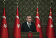 Turkey's President Recep Tayyip Erdogan deliver a speech at an event in Ankara, Turkey, Thursday, Jan. 2, 2020. Turkey's parliament on Thursday authorised the deployment of troops to Libya to support the U.N.-backed government in Tripoli battle forces loyal to a rival government that is seeking to capture the capital. Turkish lawmakers voted 325-184 at an emergency session in favour of a one-year mandate allowing the government to dispatch troops amid concerns that Turkish forces could aggravate the conflict in Libya and destabilise the region. (Presidential Press Service via AP, Pool)