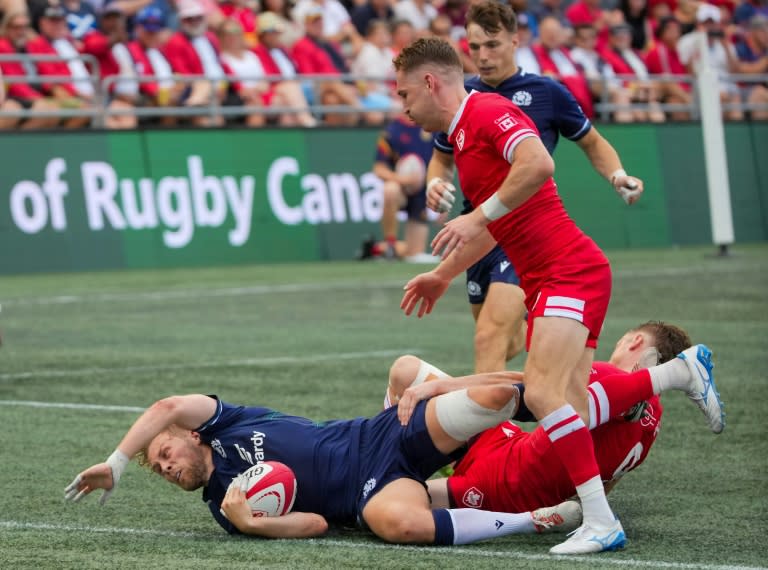 Scotland's Gus Warr scores a try against Canada in his debut match for his national team in Scotland's 73-12 romp at Ottawa (Chris Tanouye)