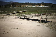 Boat ramps sit on the dry bed of a part of Lake Casitas that was formerly under water in Ojai, California, April 16, 2015. REUTERS/Lucy Nicholson