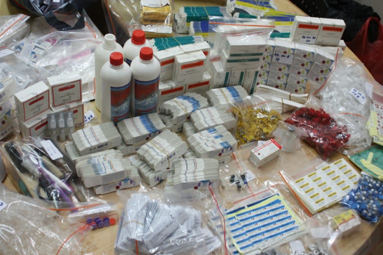 Fake vaccine medication seized from a criminal syndicate is put on display at the Criminal Investigation Agency of the National Police in Jakarta