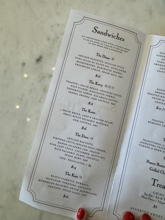 Restaurant menu titled "Sandwiches" lists options like The Dinnie, The Kerry, The Dom, The Dave, The Kate with descriptions of ingredients and prices