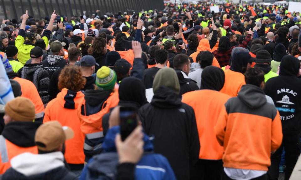 Protesters, many in hi-vis attire, on the West Gate Bridge