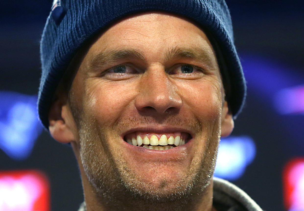 FOXBOROUGH, MA - OCTOBER 8: New England Patriots quarterback Tom Brady smiles as he is told by a reporter that former teammate Rob Gronkowski will be an analyst on Fox Thursday Night Football for the upcoming Patriots game during Brady's media availability ahead of New England Patriots practice at Gillette Stadium in Foxborough, MA on Oct. 8, 2019. (Photo by John Tlumacki/The Boston Globe via Getty Images)