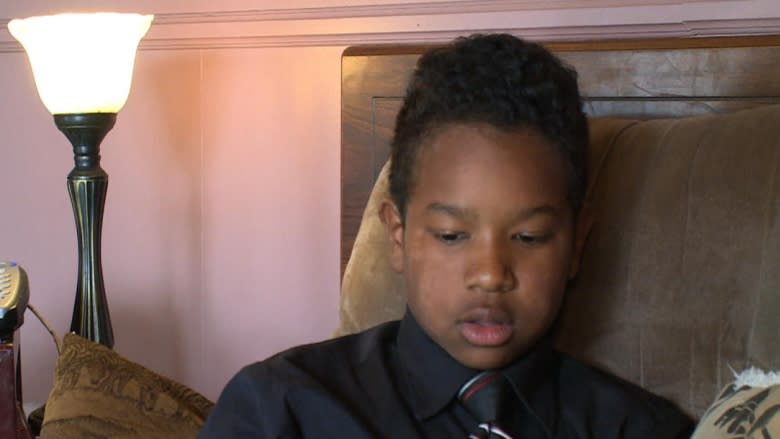 Torrence Collier, 11, said he feels horrible about himself when he hears racist comments directed toward him at his school in Westport.