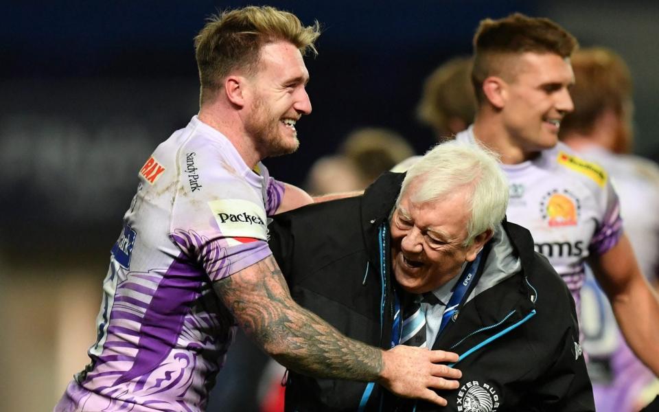 Tony Rowe celebrates with Stuart Hogg - GETTY IMAGES