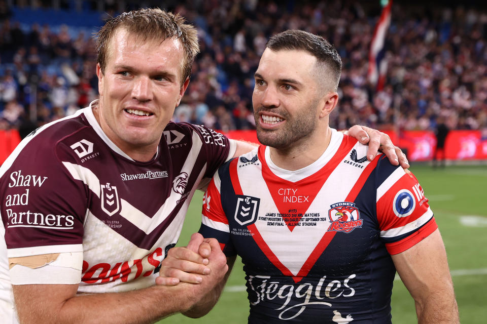 Jake Trbojevic and James Tedesco embrace.