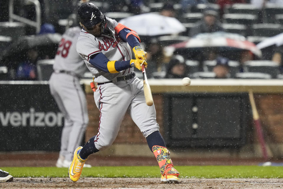 Atlanta Braves' Ronald Acuna Jr. hits an RBI Single during the fifth inning of the team's baseball game against the Atlanta Braves, Friday, April 28, 2023, in New York. (AP Photo/Bryan Woolston)