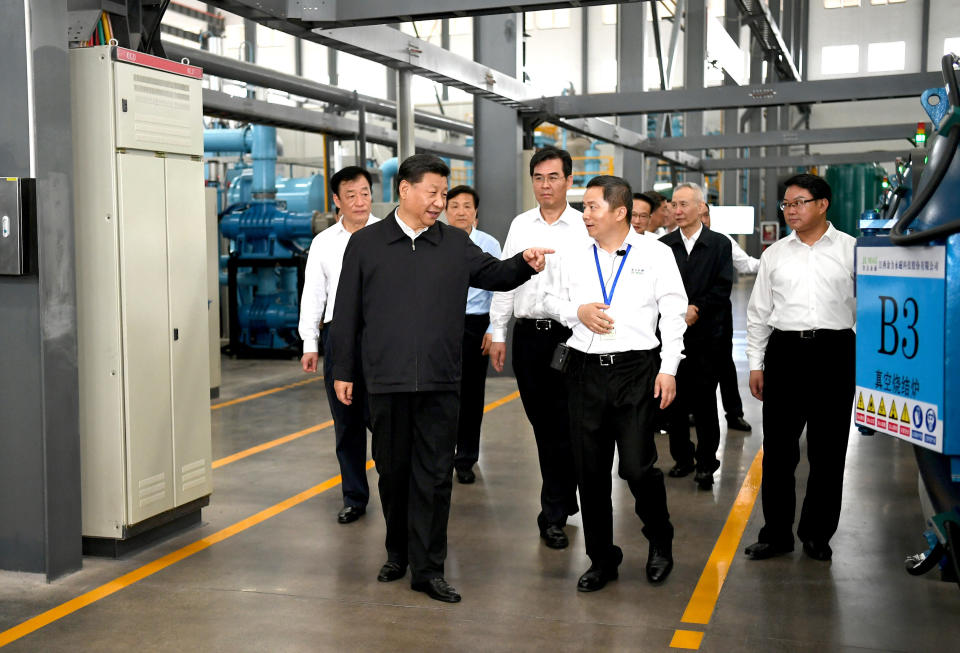 GANZHOU, May 20, 2019 -- Chinese President Xi Jinping, also general secretary of the Communist Party of China Central Committee and chairman of the Central Military Commission, learns about the production process and operation of the JL MAG Rare-Earth Co. Ltd. as well as the development of the rare earth industry in the city of Ganzhou in east China's Jiangxi Province on May 20, 2019. Xi Jinping visited Jiangxi Province Monday on an inspection tour. (Xinhua/Xie Huanchi) (Xinhua/ via Getty Images)