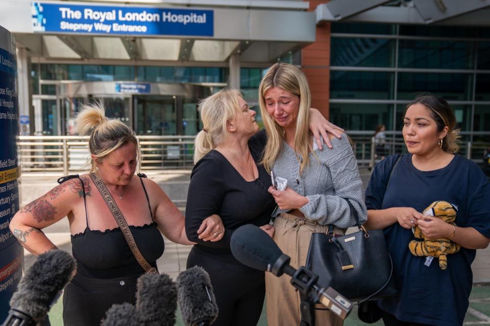 Hollie Dance, centre left, with her family and friends (Aaron Chown/PA) (PA Wire)