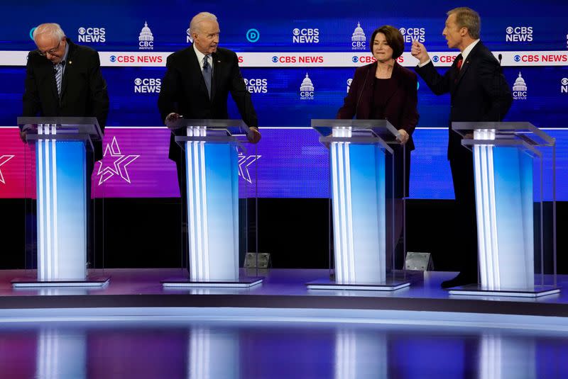 Democratic 2020 U.S. presidential candidates Senator Bernie Sanders, former Vice President Joe Biden, Senator Amy Klobuchar and billionaire activist Tom Steyer debate at the tenth Democratic 2020 presidential debate at the Gaillard Center in Charleston