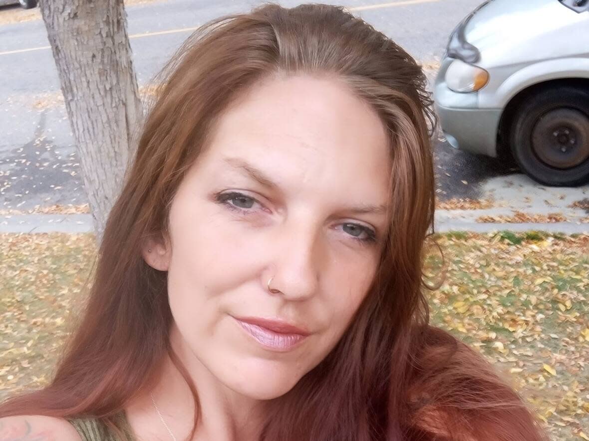 Angela McKenzie, pictured, died on Tuesday in what police are describing as a road rage incident that involved a shooting and a fatal multi-vehicle car crash.  (Angela McKenzie/Facebook - image credit)