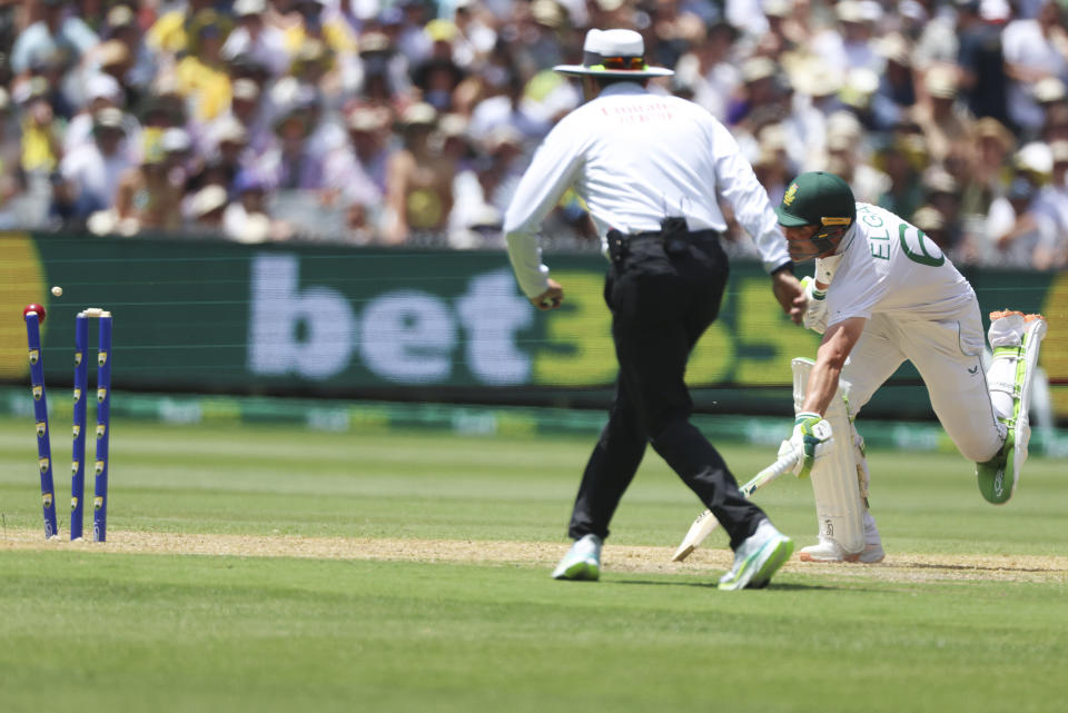 South Africa's Dean Elgar is run out during the second cricket test between South Africa and Australia at the Melbourne Cricket Ground, Australia, Monday, Dec. 26, 2022. (AP Photo/Asanka Brendon Ratnayake)