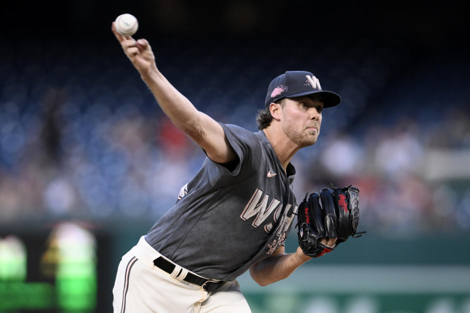 Washington Nationals starting pitcher Jake Irvin throws during the first inning of the team's baseball game against the Miami Marlins, Friday, Sept. 1, 2023, in Washington. (AP Photo/Nick Wass)