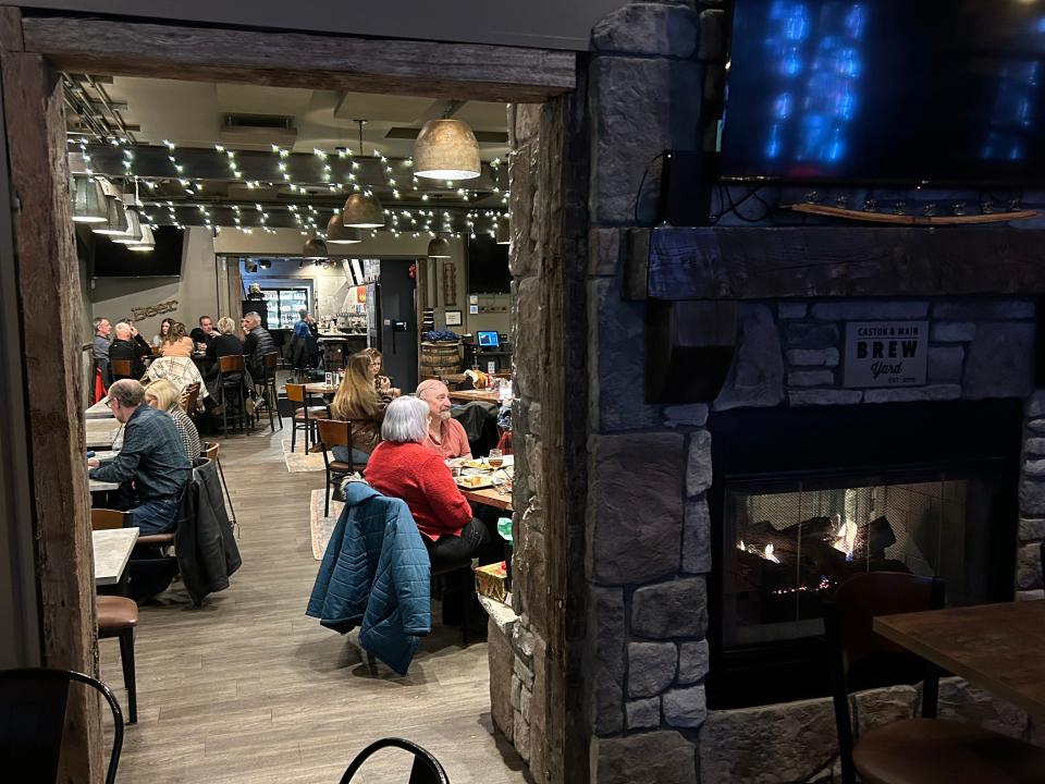 A view from the bourbon room shows Caston & Main Brew Yard's dining room.