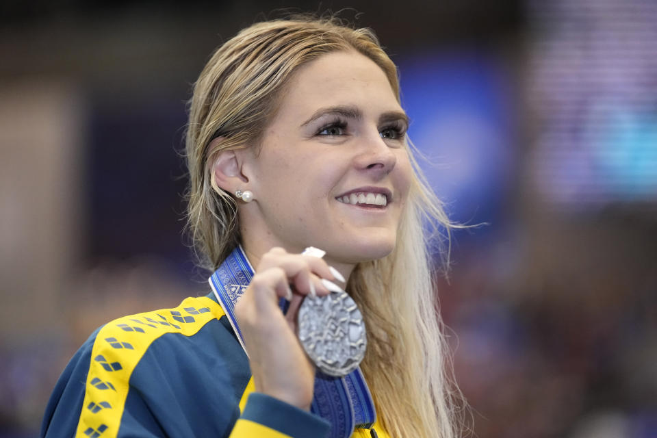 Shayna Jack of Australia shows her silver medal during the medal ceremony for women's 50m freestyle at the World Swimming Championships in Fukuoka, Japan, Sunday, July 30, 2023.(AP Photo/Lee Jin-man)