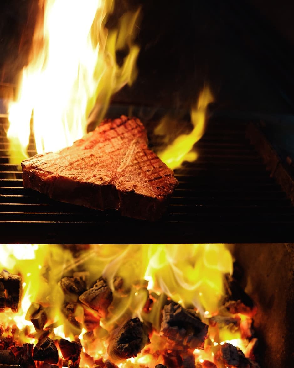 May your romance burn as bright as this grill. (Photo: Bistecca Tuscan Steakhouse)