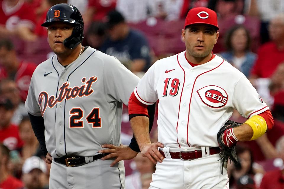 Detroit Tigers first baseman Miguel Cabrera (24) leads off second base as Cincinnati Reds first baseman Joey Votto (19) looks to pitcher Cincinnati Reds starting pitcher Vladimir Gutierrez (53) (not pictured), Friday, Sept. 3, 2021, at Great American Ball Park in Cincinnati. 