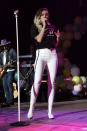 <p>The artist wore white skinny jeans, white boots, and a black graphic T-shirt while performing at the BLI Summer Jam concert. (Photo: AKM-GSI) </p>