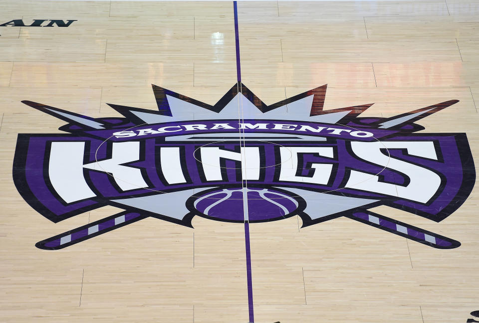 A former Kings executive pleaded guilty to wire fraud and identity theft. (Getty Images)