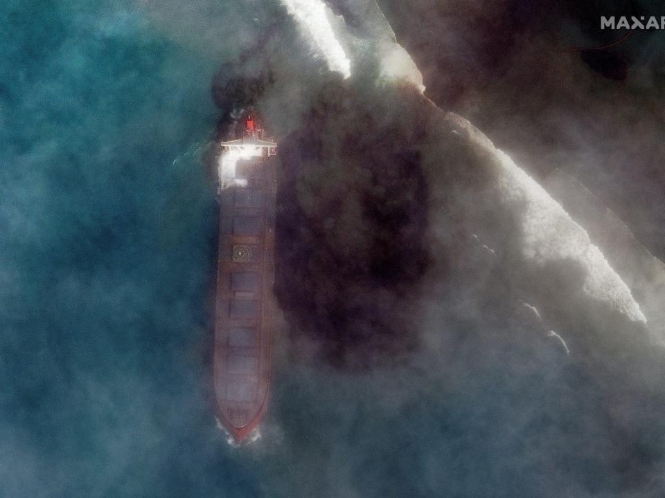 A satellite image shows the bulk carrier ship MV Wakashio and its oil spill after it ran aground off the southeast coast of Mauritius, August 7, 2020. Satellite image ?2020 Maxar Technologies/via REUTERS. ATTENTION EDITORS - THIS IMAGE HAS BEEN SUPPLIED BY A THIRD PARTY. MANDATORY CREDIT. NO RESALES. NO ARCHIVES. MUST NOT OBSCURE WATERMARK