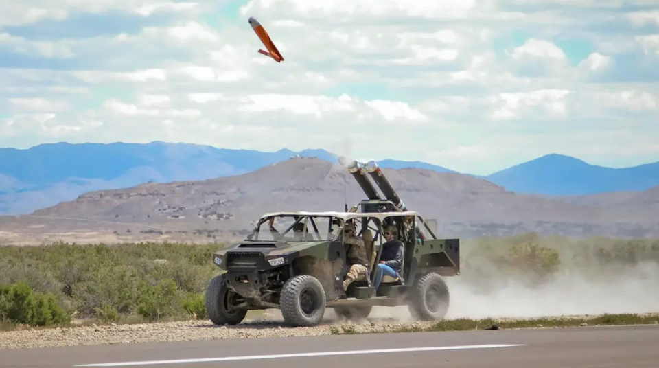 U.S. Army personnel launch an ALTIUS-600 from a DAGOR ultra-light vehicle during an exercise. <em>US Army</em>